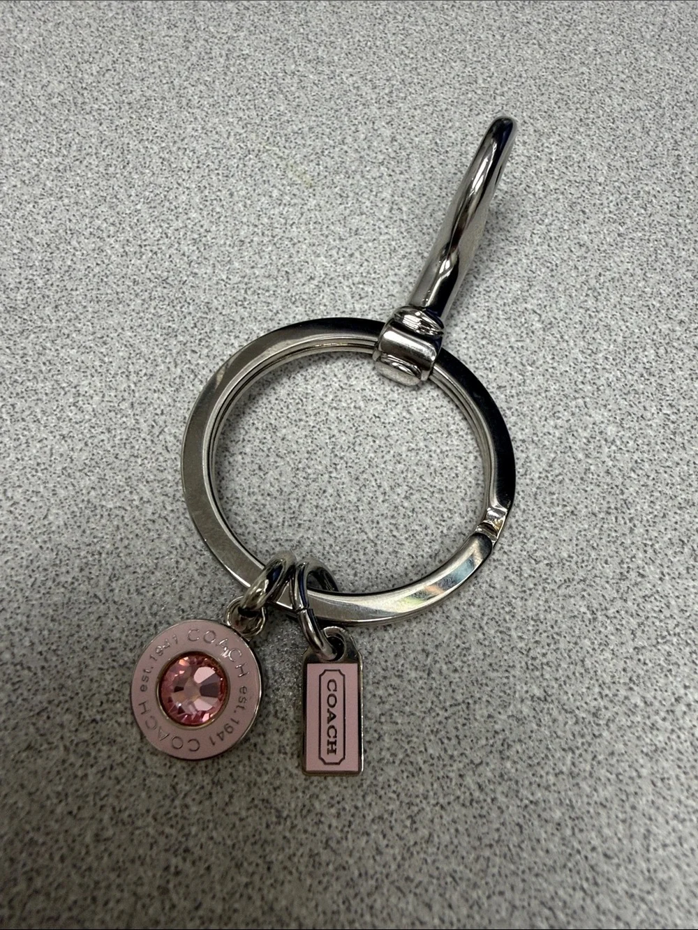 Coach Silver-Tone Key Ring with Pink Crystal and Enamel Tag